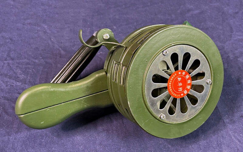 Small, handheld hand crank air-raid siren